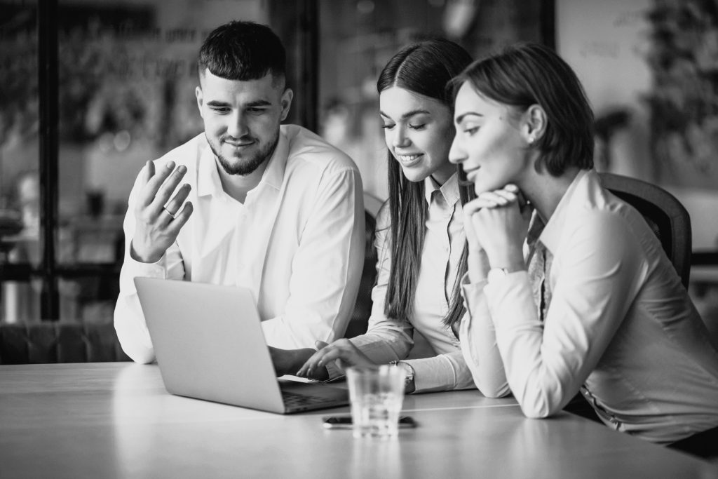 group of people working out business plan in an office
